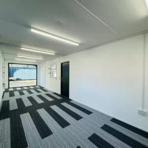 Cabaña personalizada de 9,7 x 3 m | Espacio abierto | Oficina/Comedor | Ventanal | Edificio portátil